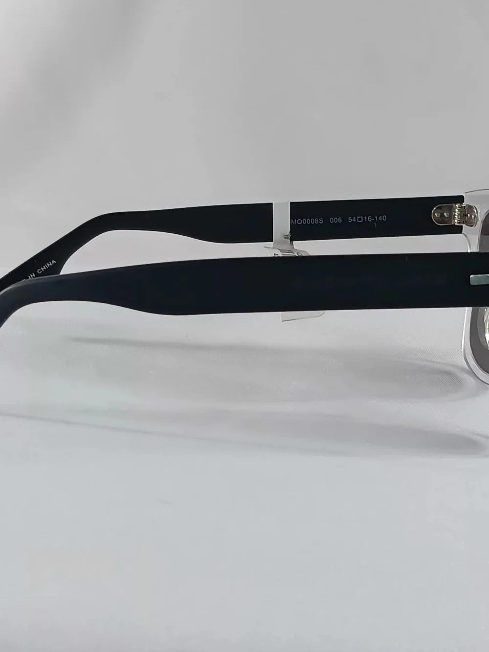 McQ by Alexander McQueen Sunglasses Translucent Black Frames Minimalist Preppy